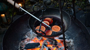 Cooking Tripod and Bowl with Mulled Wine